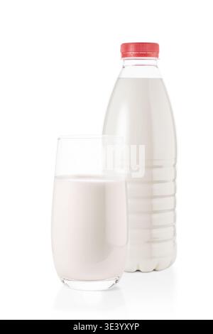A plastic bottle of milk and a white glass glass of milk on a white empty isolate background. Vertical photo for articles and healthy eating in the mi Stock Photo
