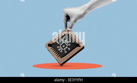 A hand lifts a computer chip displaying AI design over a plain colored background in a tech setting Stock Photo