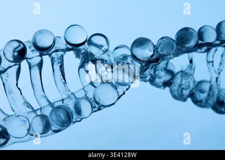 Abstract cosmetic lab. Dna double helix structure representing genetics and science Stock Photo