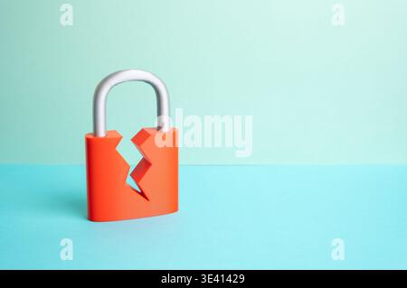 A cracked padlock. Security is compromised. The security system is compromised. Cyber risk exposes vulnerabilities. Data protection and system defense Stock Photo