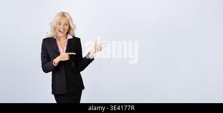 Businesswoman Presents Ideas in Office Setting With Confidence and Enthusiasm Stock Photo