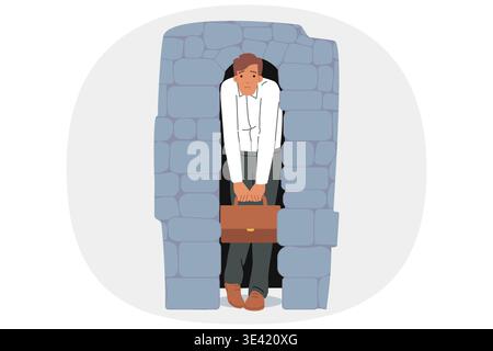 Depressed business man stands in narrow stone doorway symbolizing pressure of circumstances Stock Vector