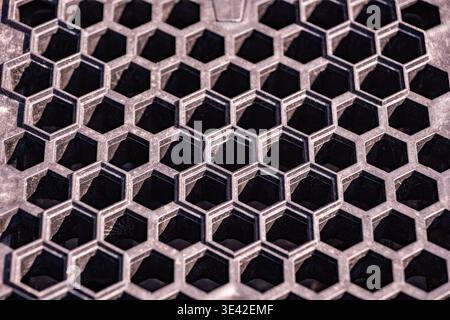 Honeycomb pattern structure creating an abstract geometric grid background texture Stock Photo