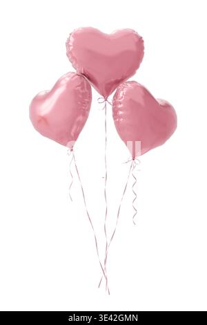 Three pink glossy heart balloons with pink glossy ribbons on isolated background. 3d rendering Stock Photo