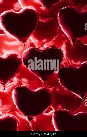 Glossy heart balloons background. Red hear-shaped balloons. Romantic background. Dark lighting. 3d rendering Stock Photo