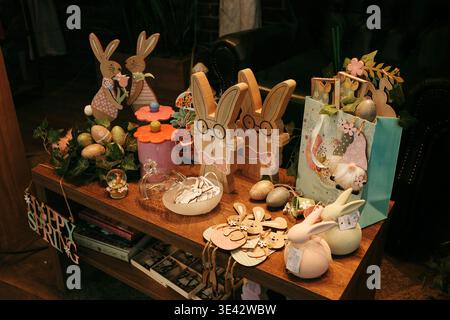 Easter themed shop display with decorative rabbits, eggs and seasonal gifts in Belgrade, ideal for holiday marketing, retail and spring promotion Stock Photo