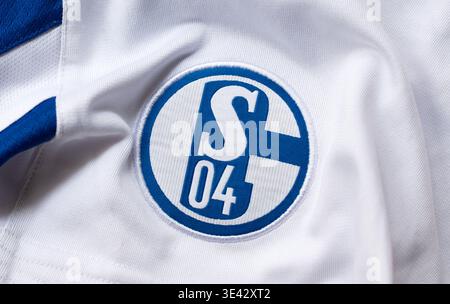 Kyiv, Ukraine. March 21, 2026. Close-up of FC Schalke 04 crest on a white and blue football jersey. Stock Photo