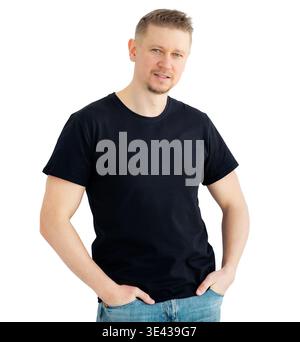 Handsome Man Poses In A Black Blank T-Shirt Isolated On A White Background Stock Photo