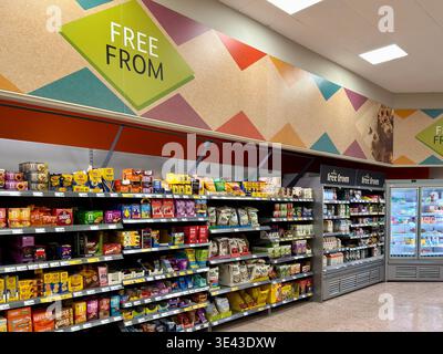 Morrisons Free From gluten free supermarket aisle in UK showing specialist dietary products for coeliac disease and allergen free diets Stock Photo