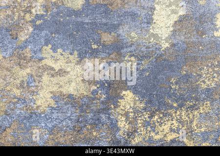 Wall texture with mottled blue and ochre patina Stock Photo