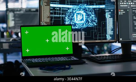 Close up of mockup laptop in data center doing neural network visualization using code debugging tech. Isolated screen notebook in server room powering deep learning and automated research tasks Stock Photo