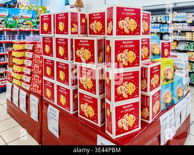 Fossano, Italy – March 25, 2026: Balocco’s Colomba Classica, a traditional dove-shaped Easter cake Displayed in stacked red boxes in supermarkets, Bal Stock Photo