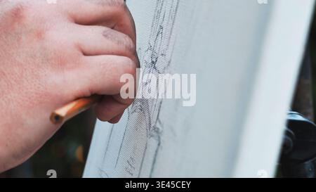 Hand drawing architecture sketch on canvas with pencil in Moscow park Stock Photo