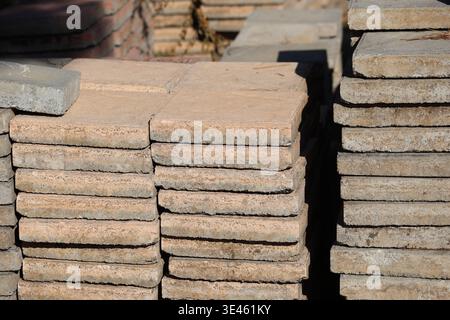 old stack of paving stones ready for reuse Stock Photo
