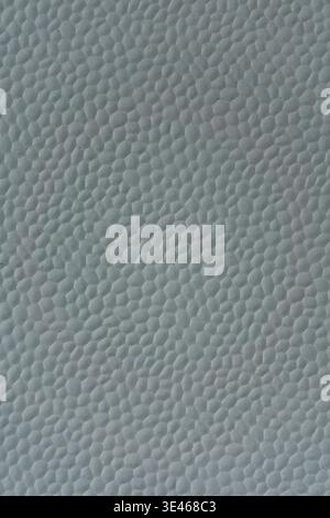 Close up of white styrofoam surface with visible granular porous structure. Stock Photo