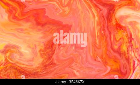 Abstract fluid art background with orange red and yellow swirling marble pattern Stock Photo