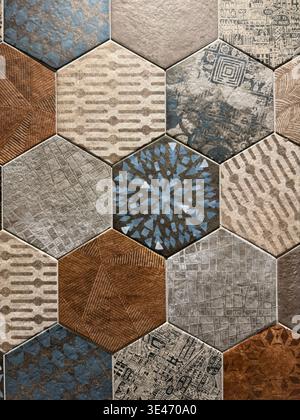 Decorative patterned hexagonal tiles in earthy tones forming intricate geometric background. Mobile photo Stock Photo