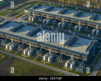 Aerial view of large data center ai campus featuring multiple buildings with advanced cooling units, representing modern cloud computing and internet Stock Photo