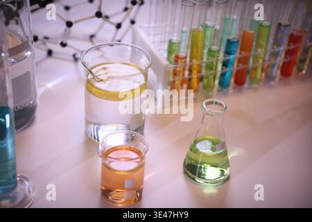 Colorful liquids and glassware create a vibrant scene in a modern laboratory focused on scientific exploration and discovery Stock Photo