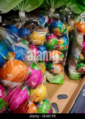 Lyon,France-March 26,2026: Chocolate eggs at colourful package are at the packet on the shop shelf. Present for Easter Stock Photo