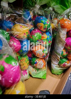 Lyon,France-March 26,2026: Chocolate eggs at colourful package are at the packet on the shop shelf. Present for Easter Stock Photo