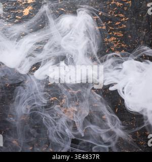 Abstract white smoke on dark concrete background square texture copy spaces Stock Photo