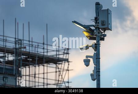 Security Surveillance Cameras Monitoring Construction Site Stock Photo