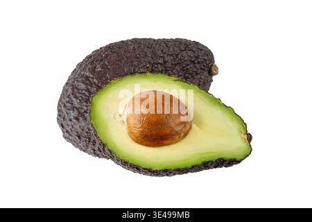 Whole and half ripe avocado Hass isolated on white background. Sliced brown raw avocado. Fruits collection Stock Photo