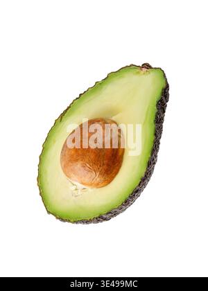Half ripe avocado Hass isolated on white background. Sliced brown raw avocado. Fruits collection Stock Photo