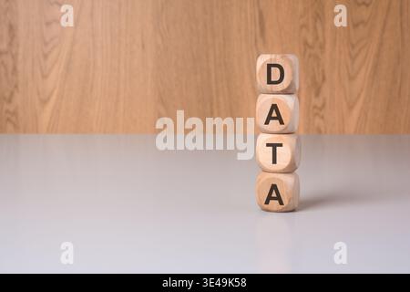 DATA word on vertical wooden blocks. Big data, analytics, information management and IT technology concept. Stock Photo