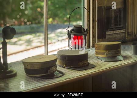 Railway Hats and Lantern - old and dusty Stock Photo