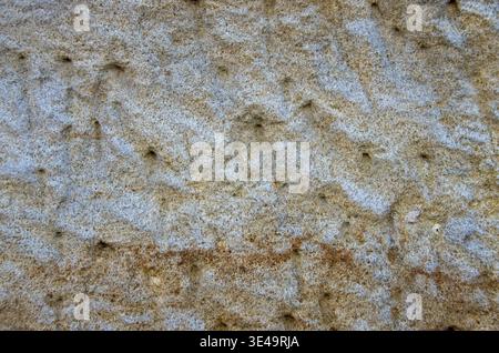 Rough sandstone surface showing natural rock texture and pattern Stock Photo