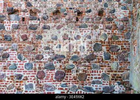 Close-up of medieval brick and stone wall texture, Mir Castle, Belarus Stock Photo