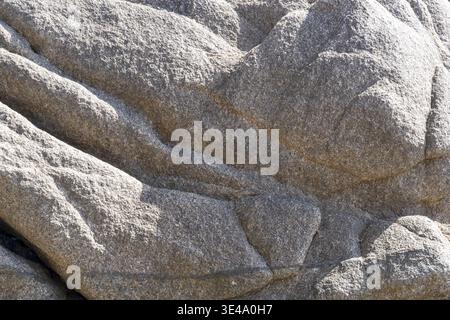 Round polished granite rocks as texture or background Stock Photo