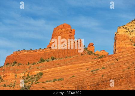 Steamboat Rock formation glowing in the early morning light near Sedona Arizona Stock Photo