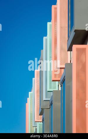 Modern architectural facade with colorful vertical panels in Stock Photo