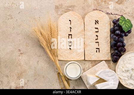 Shavuot festival celebrating ten commandments with dairy and wheat Stock Photo