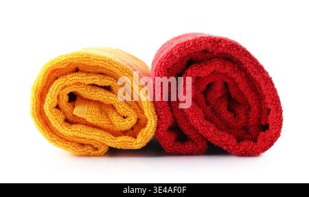 Colorful fresh terry towels isolated on white Stock Photo