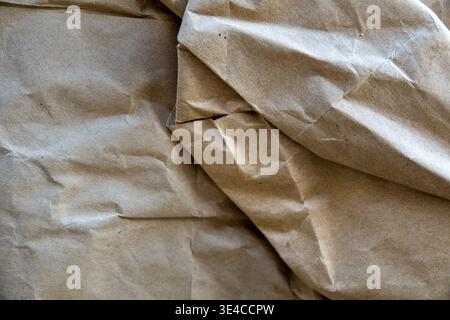 Crumpled and wrinkled rough texture paper for background and overlay Stock Photo