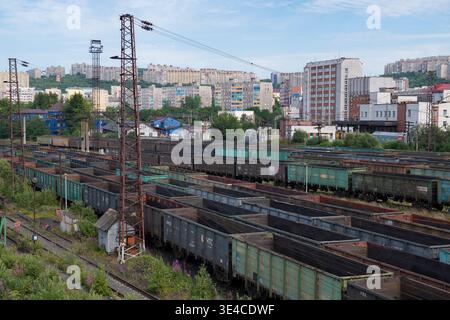 MURMANSK, RUSSIA - JULY 28, 2024: Freight trains at the Murmansk railway station on a July day Stock Photo