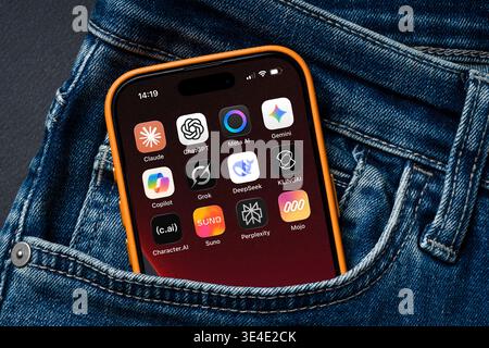 Antalya, Turkey - March 24, 2026: Smartphone showing multiple AI apps in denim pocket closeup Stock Photo