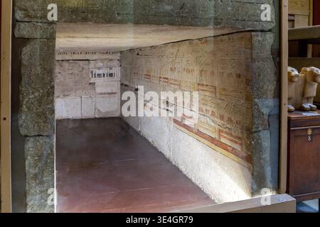 Cairo, Egypt, 24.07.21. Burial chamber decorated with colorful paintings and reliefs, view of the inside of the box in Egyptian Archaeology Museum. Stock Photo