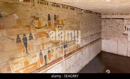 Cairo, Egypt, 24.07.21. Burial chamber decorated with colorful paintings and reliefs, view of the inside of the box in Egyptian Archaeology Museum. Stock Photo