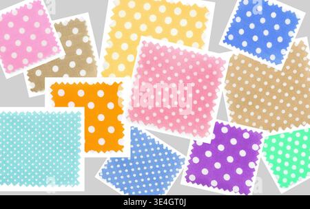 Fabric swatches with polka dots in various colors on grey background, collection Stock Photo