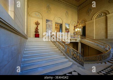 Gilded Railing Grand neoclassical staircase with gilded railings and monumental ...