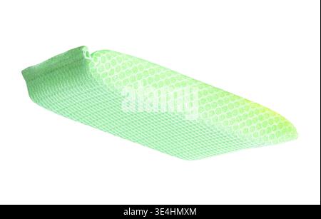 A green dish sponge is isolated on white background with clipping path. Stock Photo