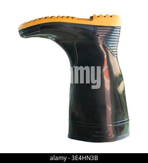 Side view of one side of black gumboot or black boot for working in garden is isolated on white background with clipping path. Stock Photo