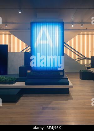 A modern shopping mall interior featuring wooden flooring and a striking digital display. Bright blue lights create a futuristic ambiance ideal for re Stock Photo