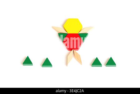 Colorful geometric wooden puzzle pieces arranged to form a flower shape with green triangles surrounding it on a white background Stock Photo