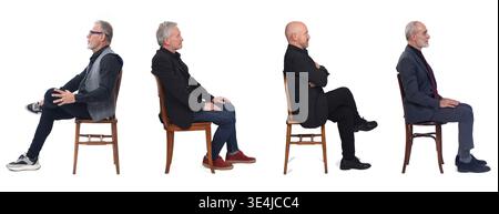 side view of a group of mature men sitting on chair on a white background Stock Photo
